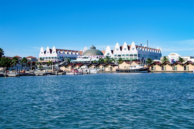 Pastel Dutch-colonial Royal Plaza Mall and marina on the Oranjestad waterfront, Aruba