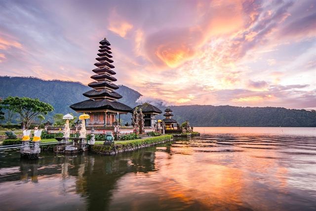 Pura Ulun Danu Beratan water temple on Lake Bratan at sunset, Bali