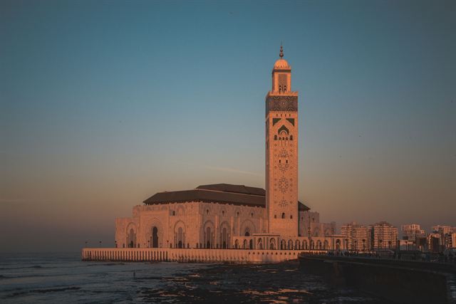 Hassan II Mosque and its tall minaret on the Atlantic shore of Casablanca, Morocco