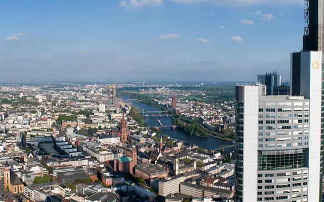 Aerial view of Frankfurt old town, the Main River bridges and a bank tower
