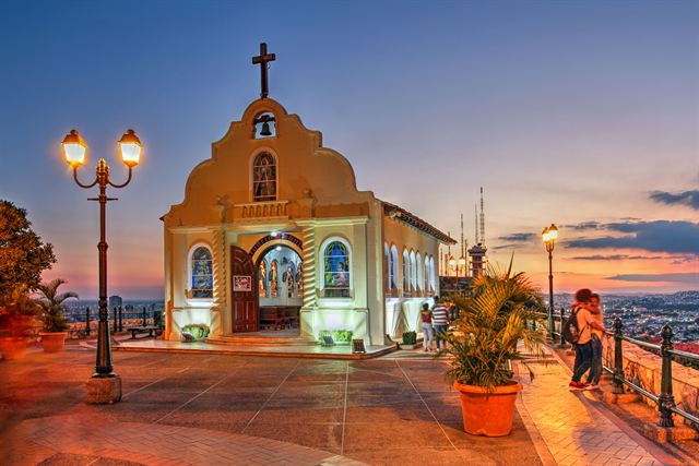 Chapel on the summit of Santa Ana hill in Guayaquil at sunset with lamp posts