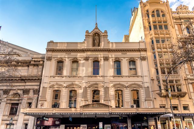 Ornate Victorian facade of the Athenaeum Theatre on Collins Street, Melbourne
