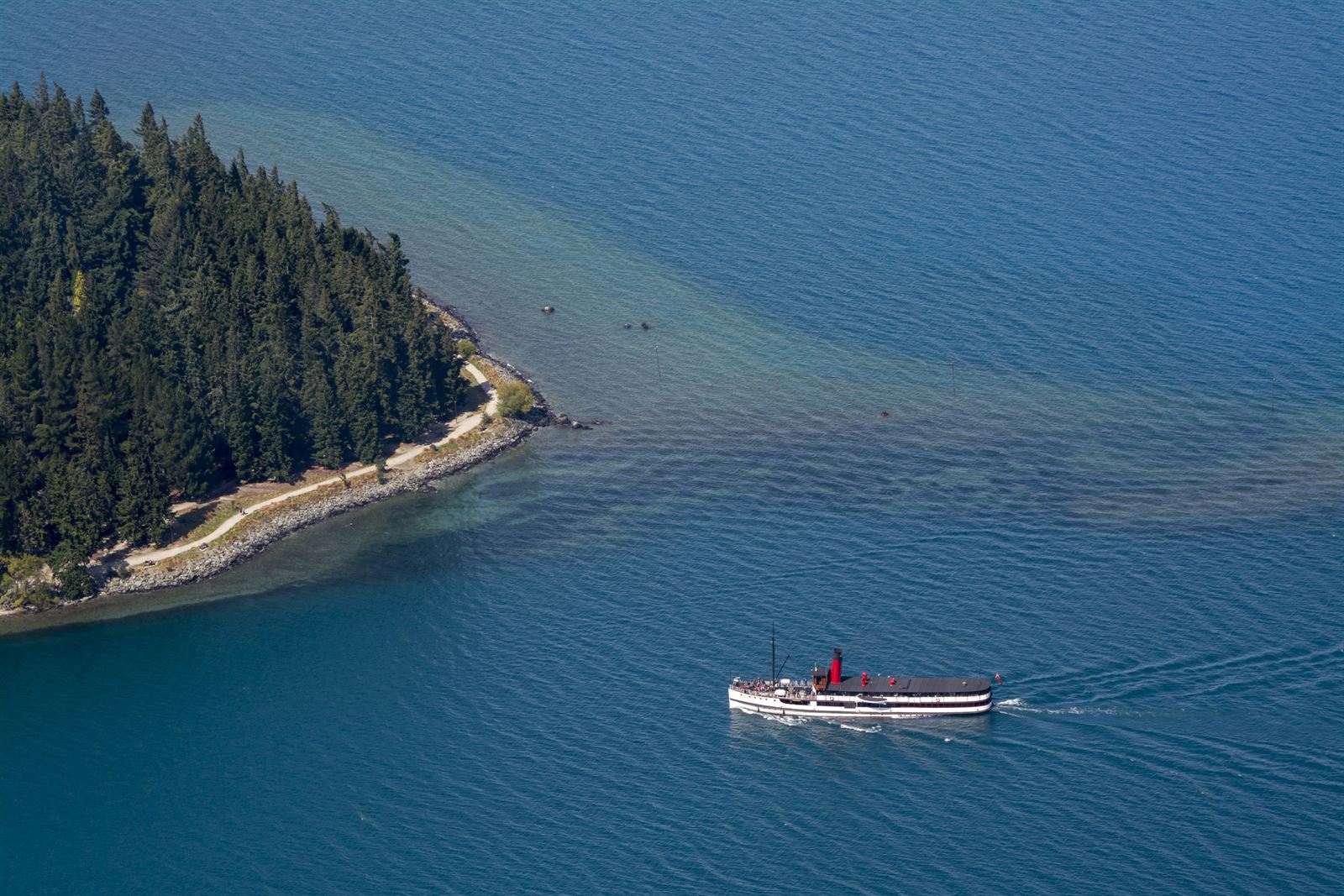 Aerial view of the TSS Earnslaw steamship crossing Lake Wakatipu near Queenstown