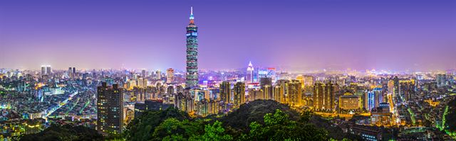 Taipei city skyline at twilight with the illuminated Taipei 101 tower, Taiwan