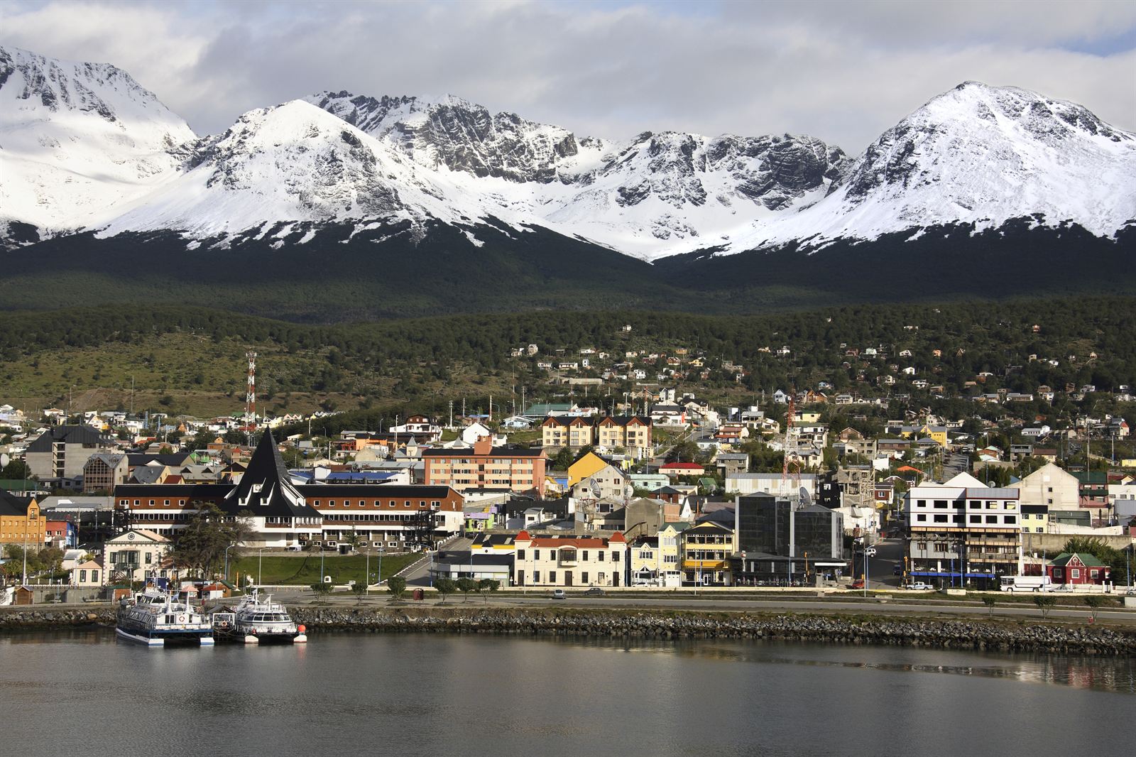 Ushuaia harbor and town below the snow-capped Martial Mountains, Tierra del Fuego, Argentina
