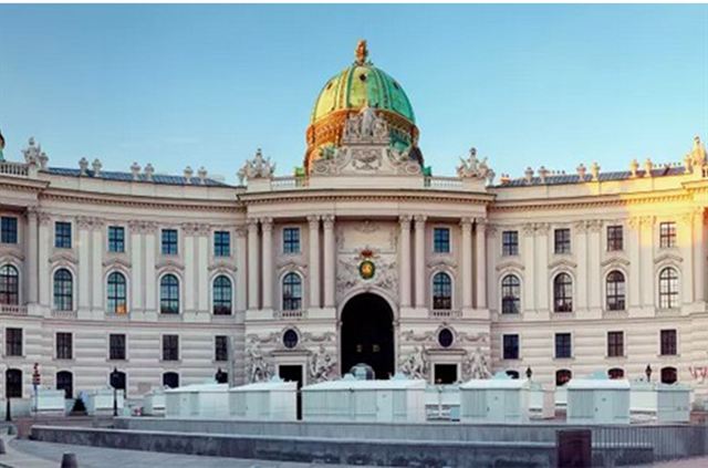 Neue Burg wing of the Hofburg Palace with its green dome on Heldenplatz, Vienna